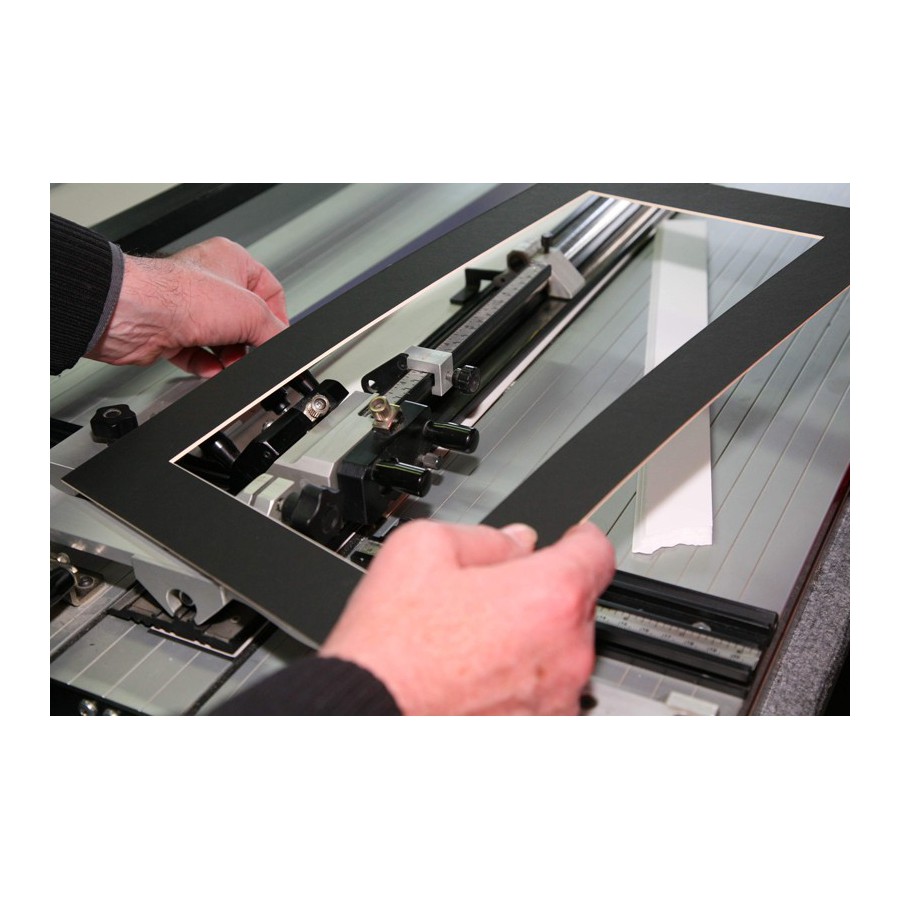 Machines for cutting mat boards